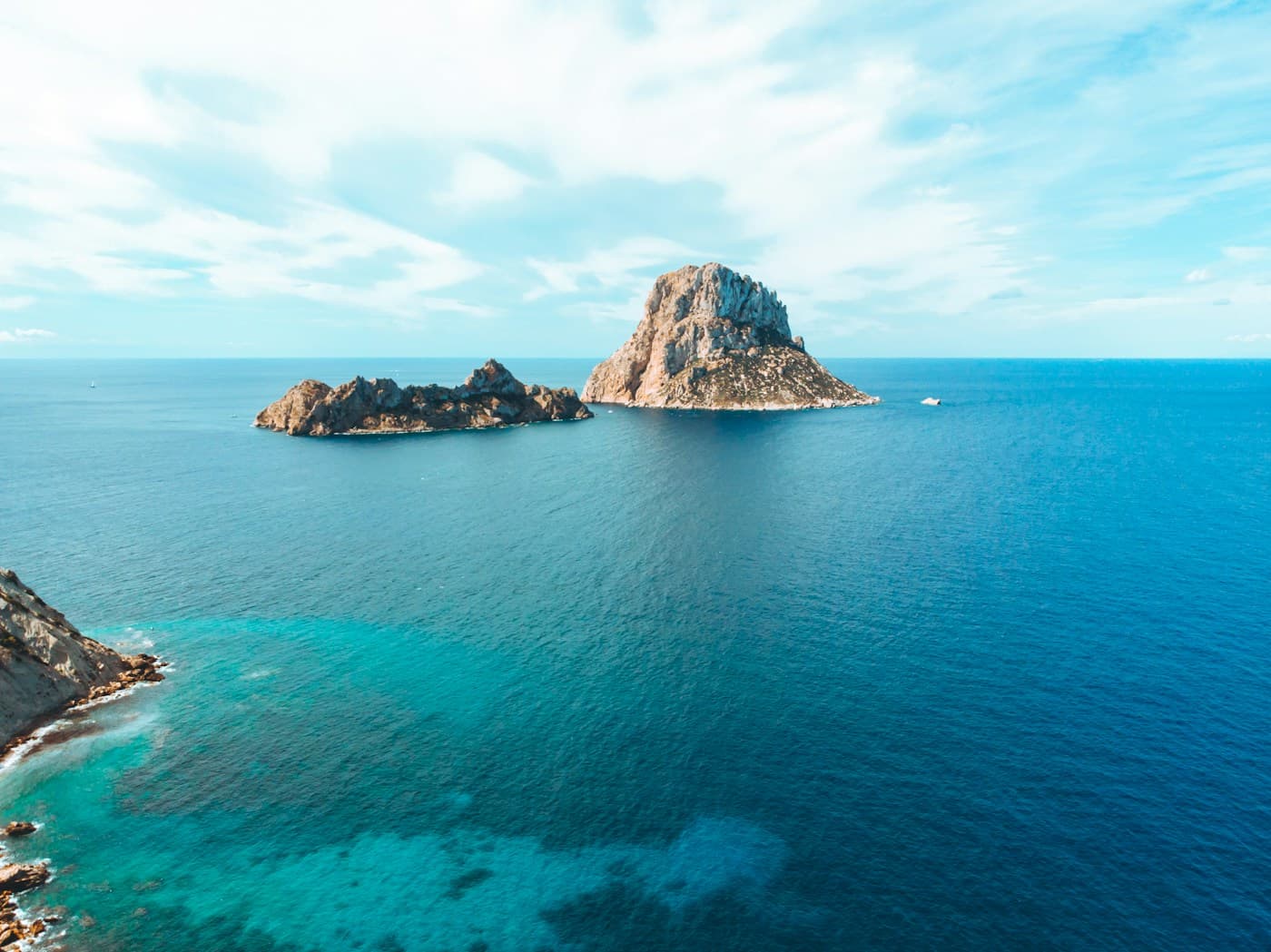 Es Vedra rising out of the sea off the coast of Ibiza