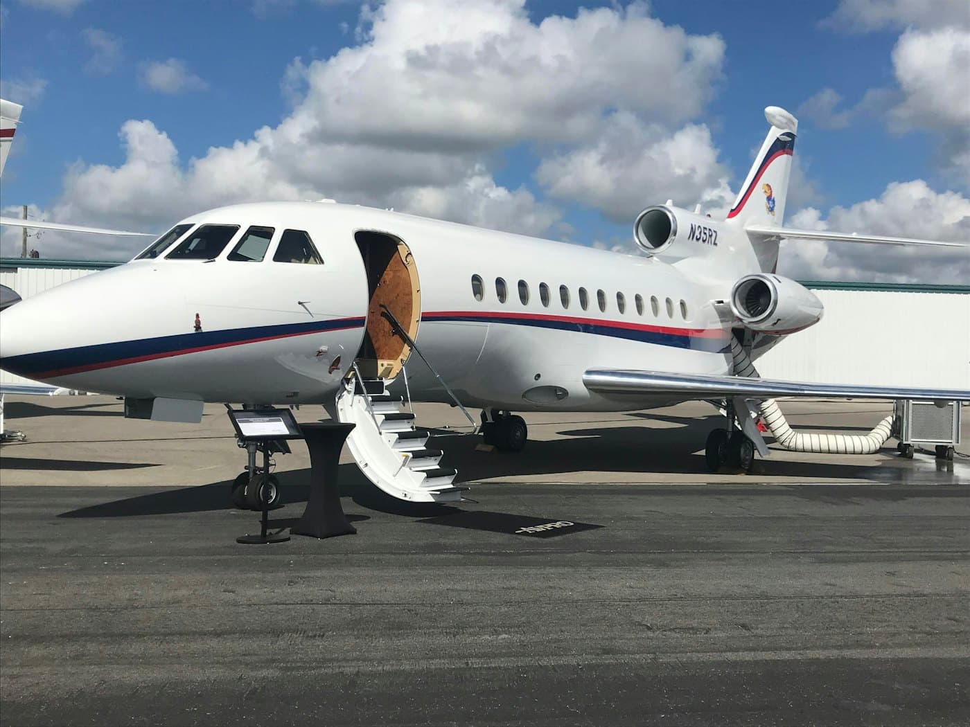 Business jet on the apron with the airstair down